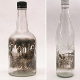 艺术家Jim Dingilian在废弃酒瓶里营造烟雾缭绕的或美丽或阴郁的场景。